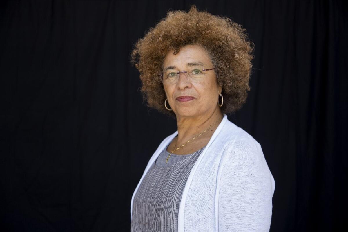 Angela Y. Davis, who began her academic career at UCLA 45 years ago, is back as regents' professor in the gender studies department, teaching about feminism and prison abolition and bringing to her academics her intense personal politics.