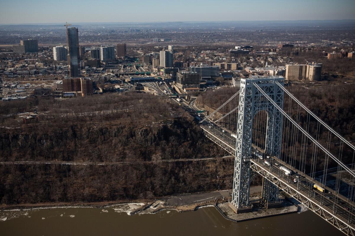 This file photo shows the George Washington Bridge and Fort Lee, N.J. Aides to New Jersey Gov. Chris Christie closed access roads to the bridge last September, causing a four-day traffic jam.