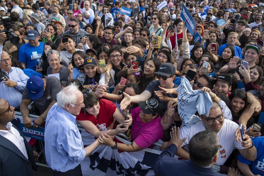 SANTA ANA, CALIF. -- FRIDAY, FEBRUARY 21, 2020: Democratic Presidential candidate Bernie Sanders greets supporters after speaking at Valley High School in Santa Ana, Calif., on Feb. 21, 2020. (Allen J. Schaben / Los Angeles Times)