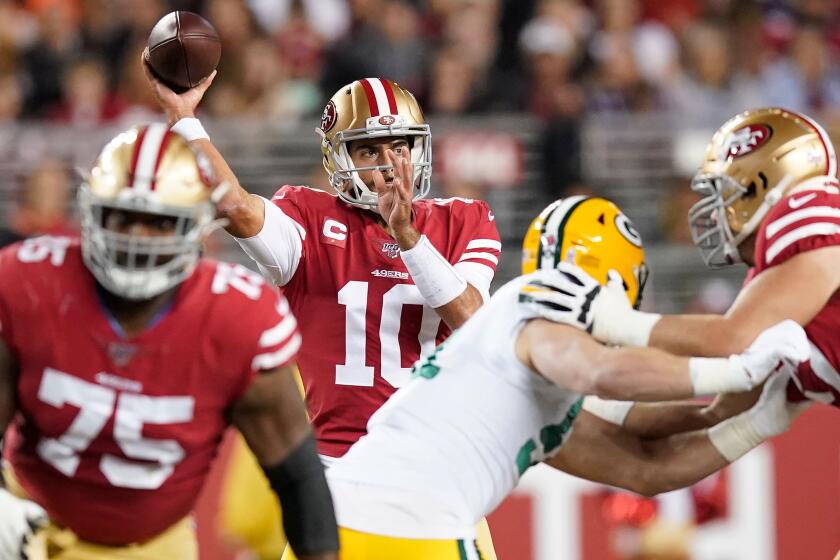 Mandatory Credit: Photo by JOHN G MABANGLO/EPA-EFE/REX (10484414ab) San Francisco 49ers quarterback Jimmy Garoppolo (C) passes against the Green Bay Packers during the first half of the NFL American Football game between the Green Bay Packers and San Francisco 49ers at Levi's Stadium in Santa Clara, California, USA, 24 November 2019. Green Bay Packers at San Francisco 49ers, Santa Clara, USA - 25 Nov 2019 ** Usable by LA, CT and MoD ONLY **