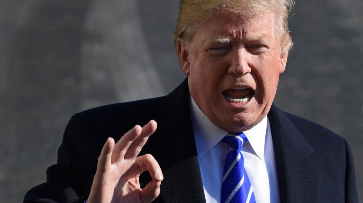 President Trump speaking with reporters as he prepares to depart the White House on Saturday.