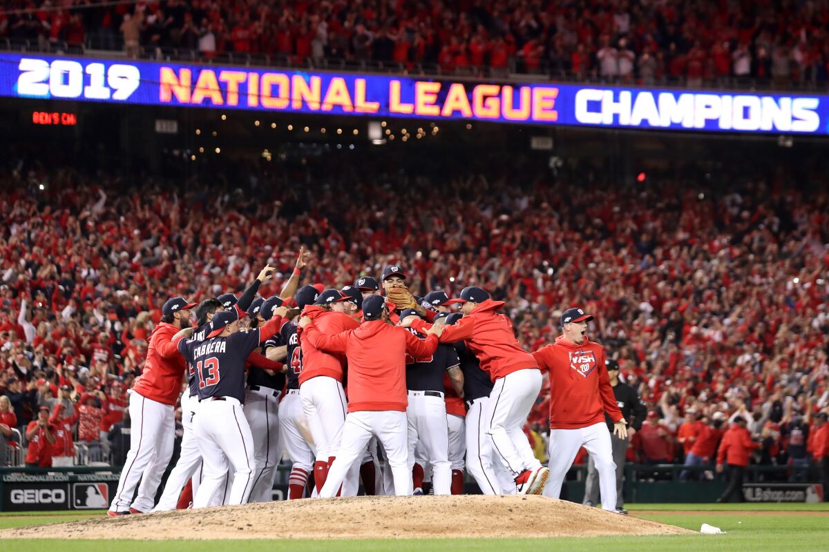 The Washington Nationals celebrate winning Game 4 and the NLCS against the St. Louis Cardinals on Tuesday in Washington, D.C.