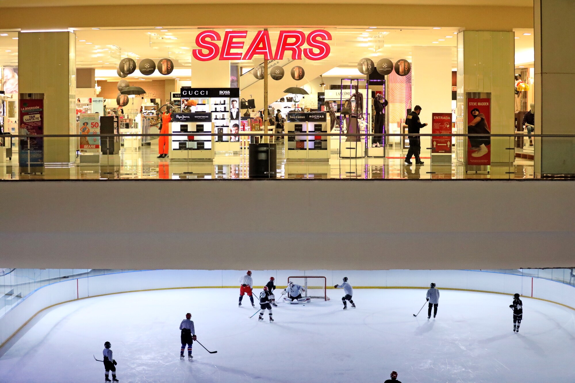 The Mexico City Jr. Kings youth hockey league in a scrimmage at the ice skating rink in Centro Santa Fe shopping mall.