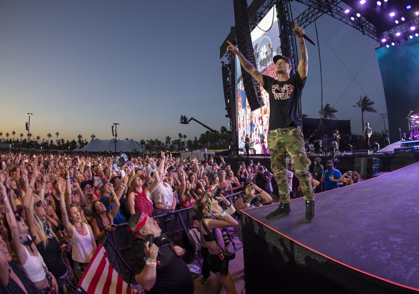 The crowd sings along as Kane Brown performs on the Mane Stage on the first day of the three-day 2019 Stagecoach Country Music Festival.
