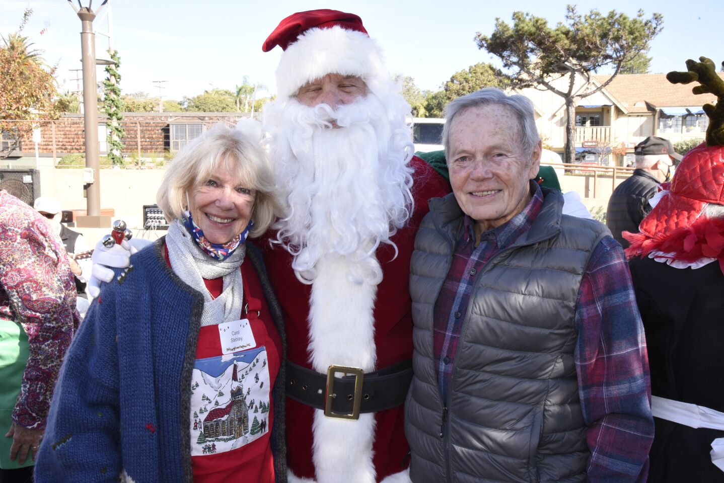 Carol Steblay , Santa aka Dan DeNike, DMCC President Terry Kopanski