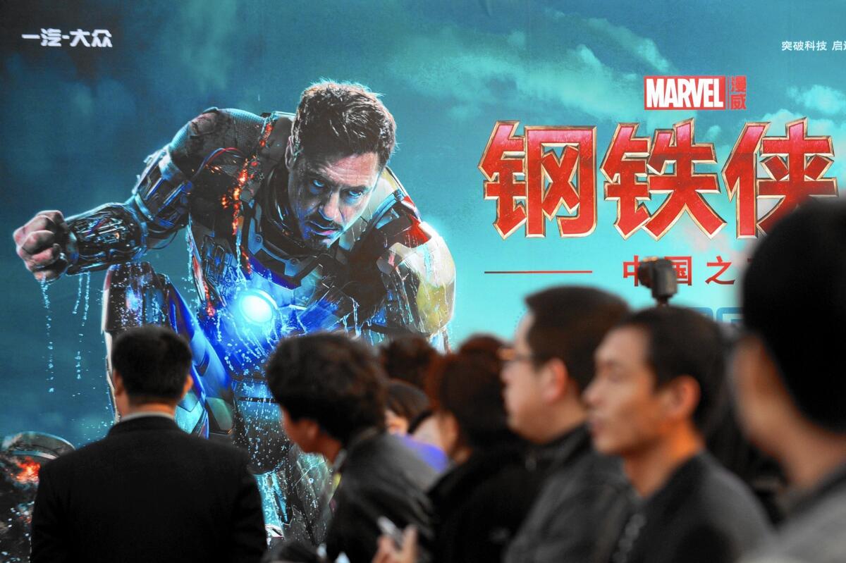 China’s film market is expected to surpass the size of the U.S. market by 2018. Above, a promotional event for ''Iron Man 3'' in Beijing in 2013.