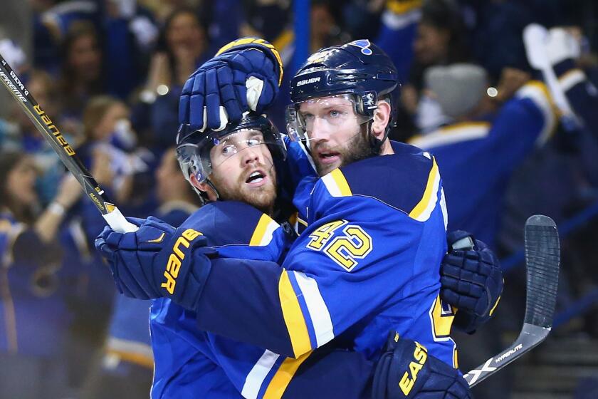Blues center David Backes (42) celebrates with Jaden Schwartz (17) after scoring a first period goal against the Sharks in Game 1 of the Western Conference finals.
