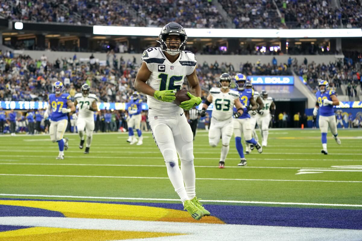 Seattle Seahawks wide receiver Tyler Lockett celebrates after scoring a first touchdown in the first quarter.