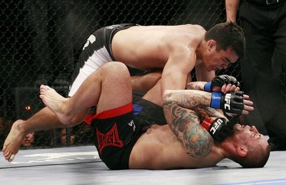 Lyoto Machida has the upper hand against Thiago Silva during their February 2009 UFC light-heavyweight fight in Las Vegas.