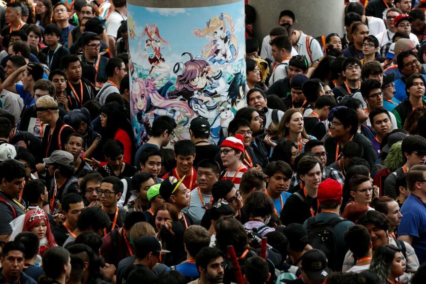 LOS ANGELES, CALIF. -- FRIDAY, JULY 1, 2016: A huge crowd awaits the opening of the Anime Expo 2016, in Los Angeles, Calif., on July 1, 2016. (Marcus Yam / Los Angeles Times)