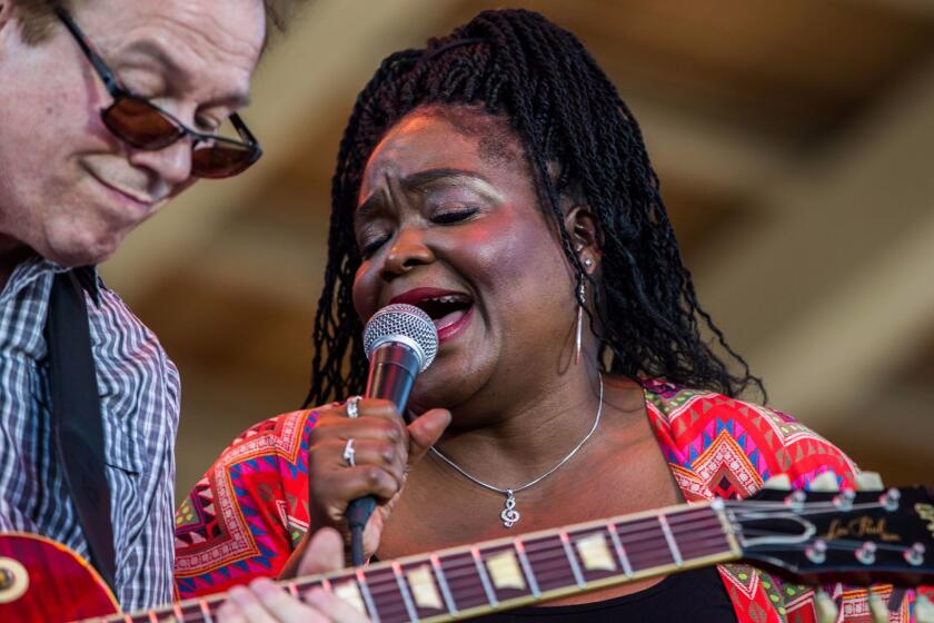 Chicago blues singer Shemekia Copeland, right, performs at Blues on the Fox festival at RiverEdge Park in Aurora on Friday, June 16, 2017. She sings with guitar player Arthur Neilson. Shemekia Copeland is the daughter of Texas blues legend Johnny Clyde Copeland. She recently had a huge change in her life: her first child, Johnny Lee Copeland-Schultz, was born on Christmas Eve. The father is her boyfriend Brian Schultz, 44. (Zbigniew Bzdak/Chicago Tribune).