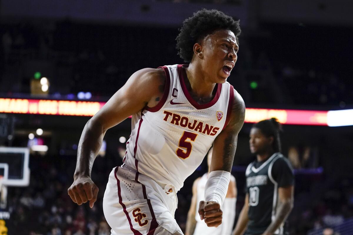 USC guard Boogie Ellis reacts after drawing a call during the first half of the Trojans' 81-70 victory over Brown.