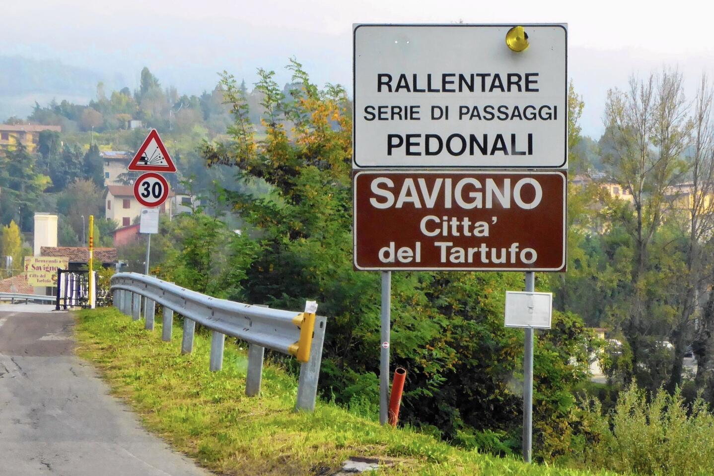 The road sign leading to the “City of Truffles.”