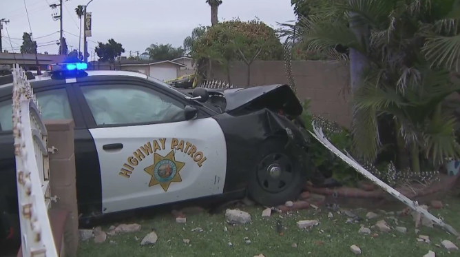 CHP cars crash into each other, dive through the fence of the house