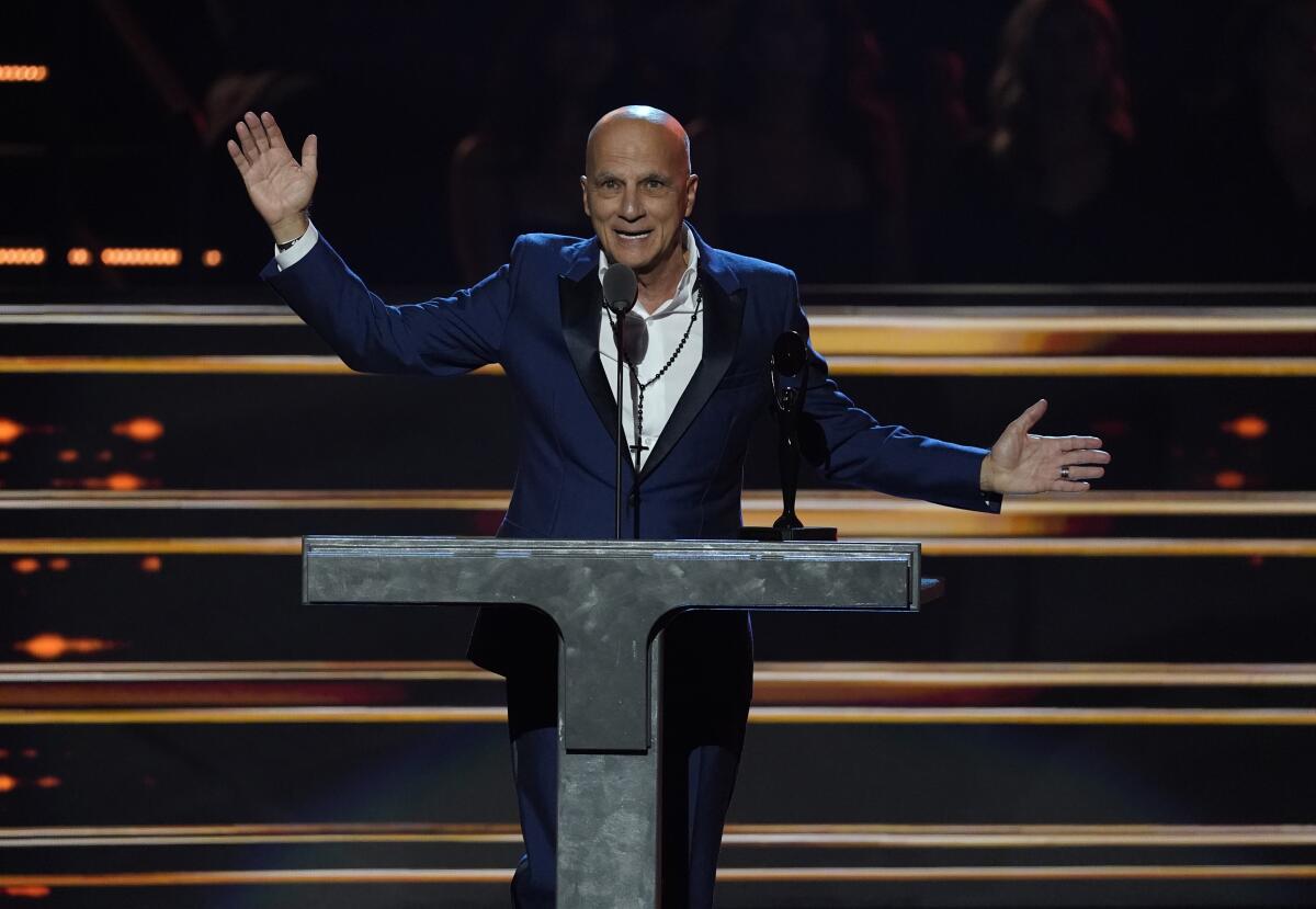 A man speaks from a podium