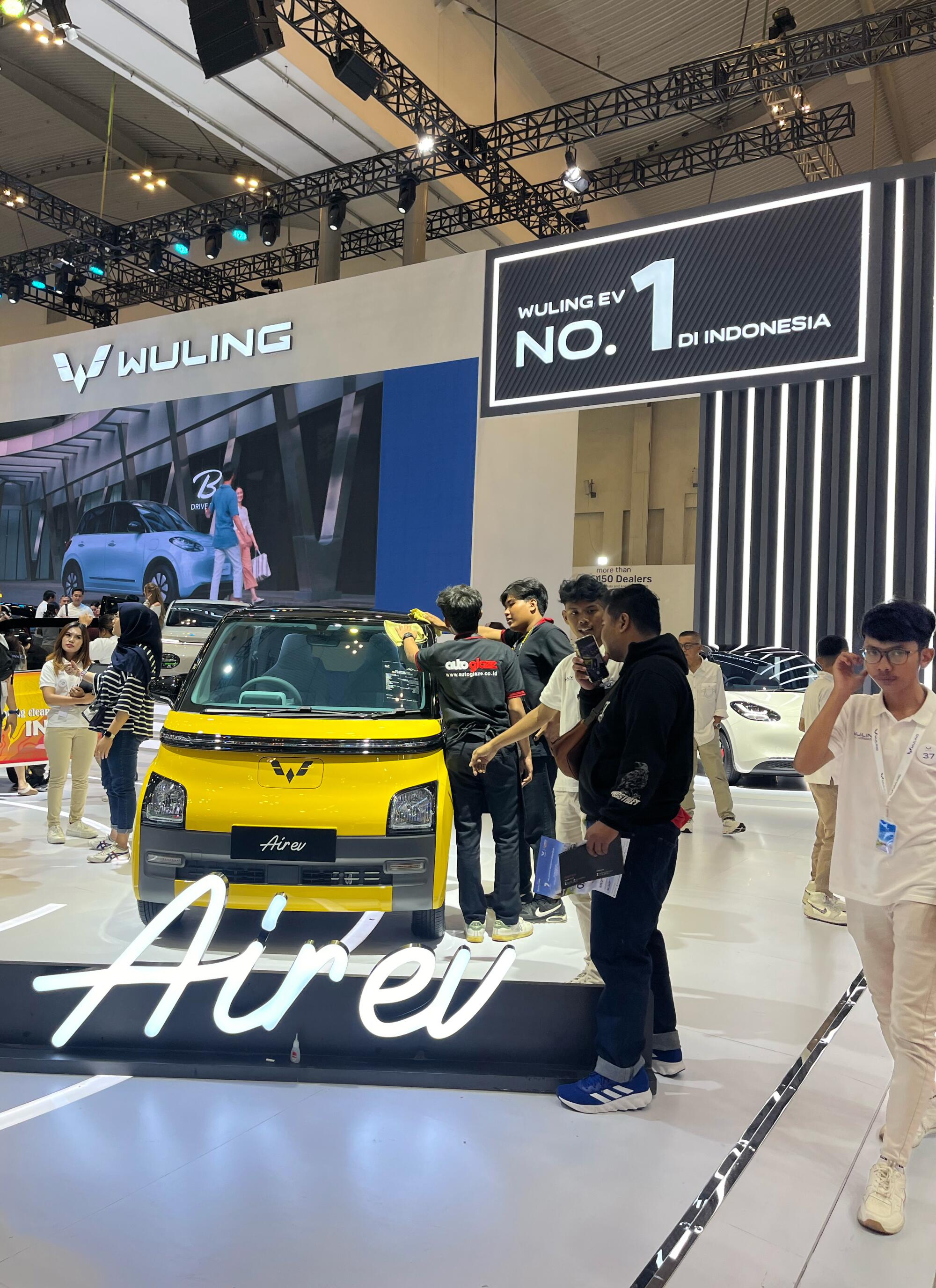 A Wuling Air EV is displayed at an auto exhibition