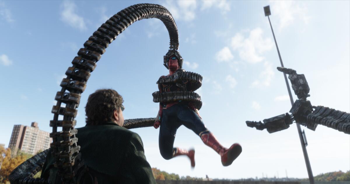 Spider-Man trapped by the mechanical tentacles of a villain.