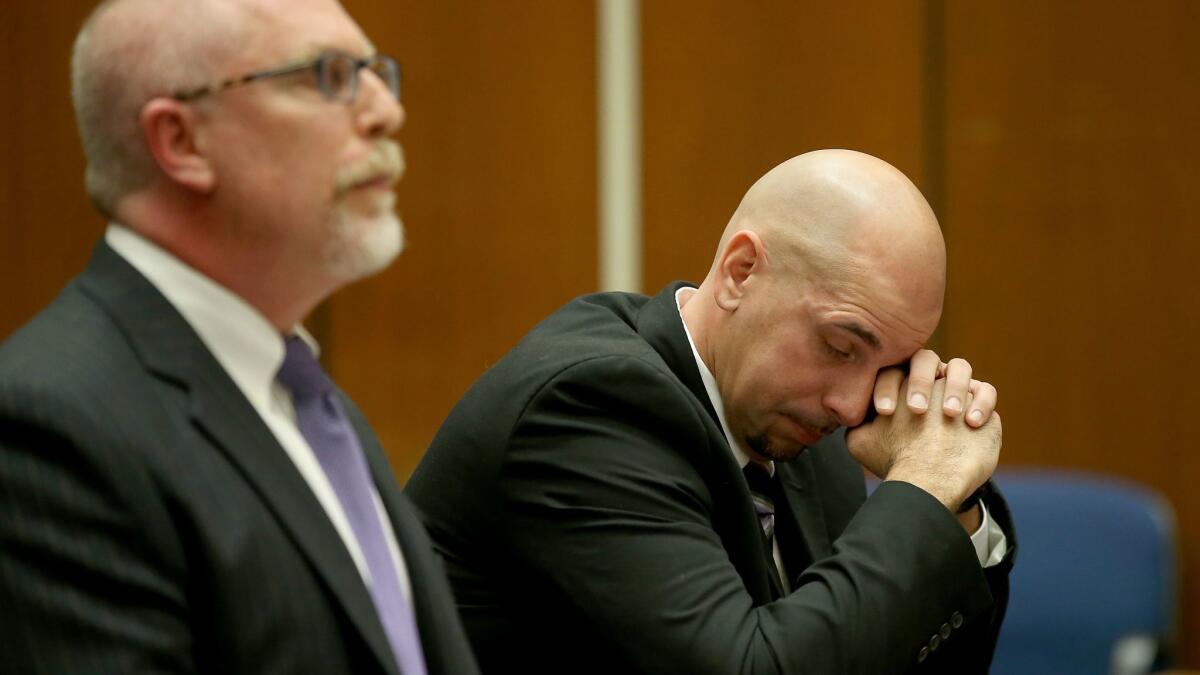 Raymond Lee Jennings, right, wipes away tears during a hearing in which Judge William Ryan said he needed more time to decide whether to vacate Jennings'conviction.