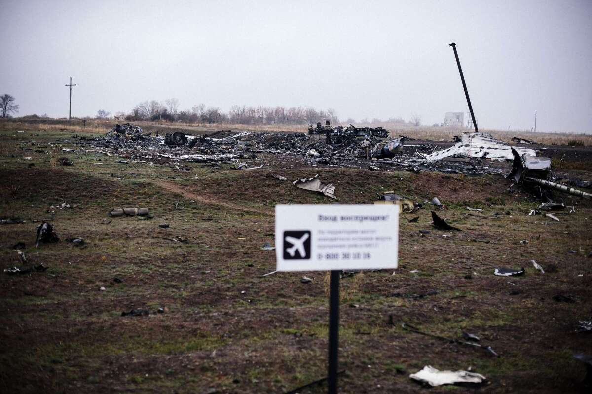 Debris and remains from Malaysia Airlines Flight 17 remain strewn across several miles of farmland around the village of Hrabove, Ukraine, nearly four months after the July 17 crash blamed on a ground-to-air missile.
