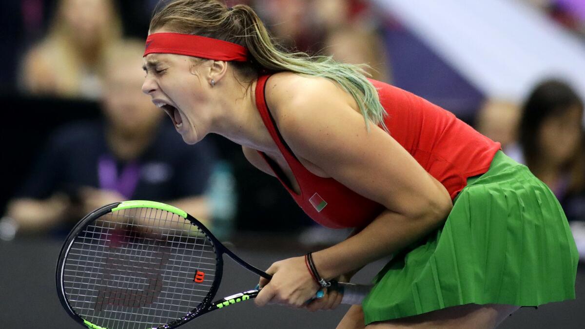 Belarus' Aryna Sabalenka reacts after winning a point against American Sloane Stephens during their Fed Cup singles match on Saturday.