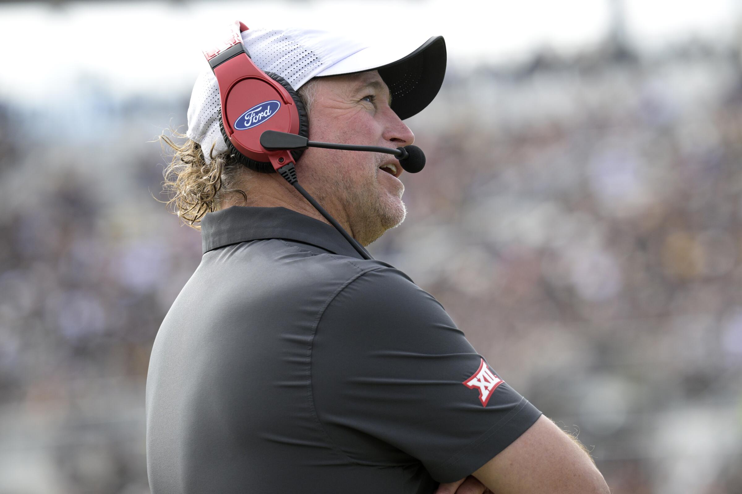 Houston head coach Dana Holgorsen watches from the sideline during a game.