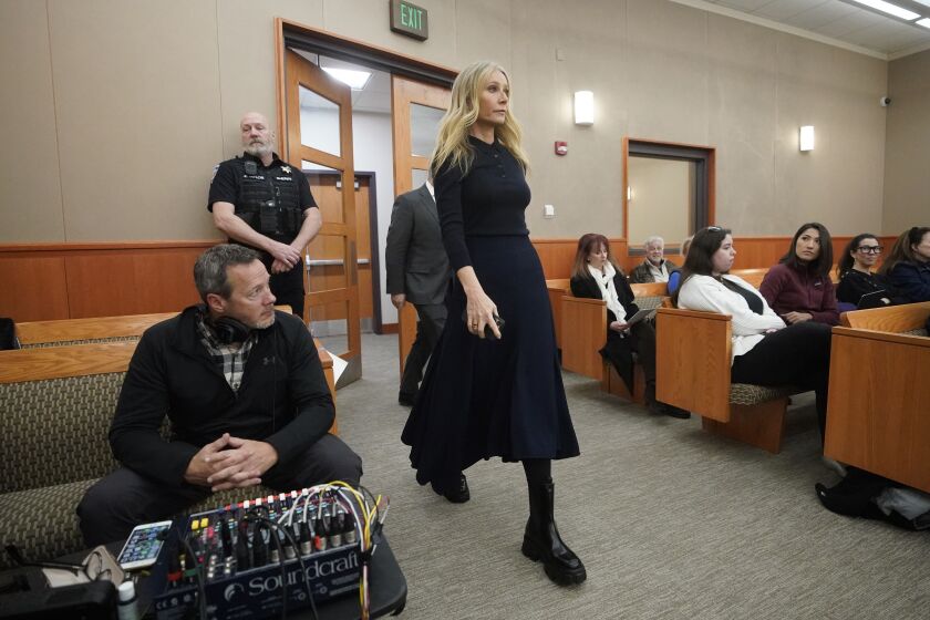 Gwyneth Paltrow enters the courtroom for her trial, Friday, March 24, 2023, in Park City, Utah, where she is accused in a lawsuit of crashing into a skier during a 2016 family ski vacation, leaving him with brain damage and four broken ribs. (AP Photo/Rick Bowmer, Pool)