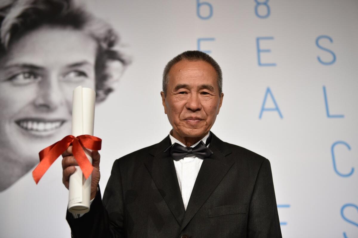 Director Hou Hsiao-Hsien, winner of the Best Director Prize for his film "Nie Yinniang" ("The Assassin"), attends the Palm D'Or Winners press conference during the 68th annual Cannes Film Festival.