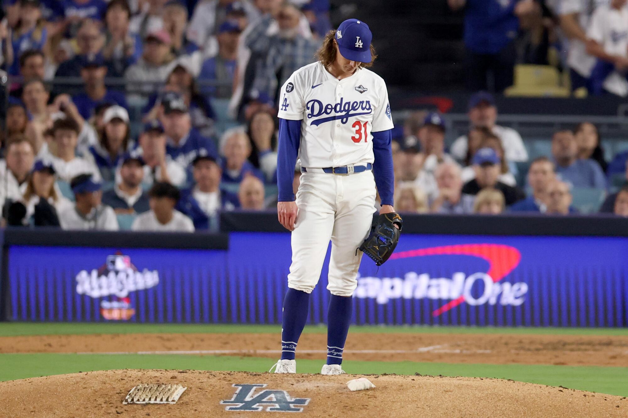 Dodgers pitcher Tyler Glasnow reacts after giving up a three-run home run to Toronto's Alejandro Kirk in the fourth inning.