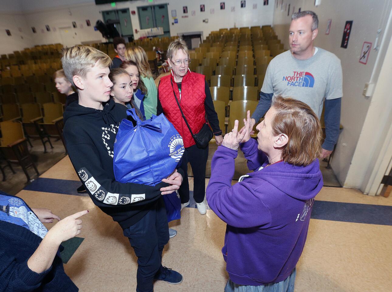 Photo Gallery: Burbank Coordinating Council holiday food and toy donation preparations for delivery