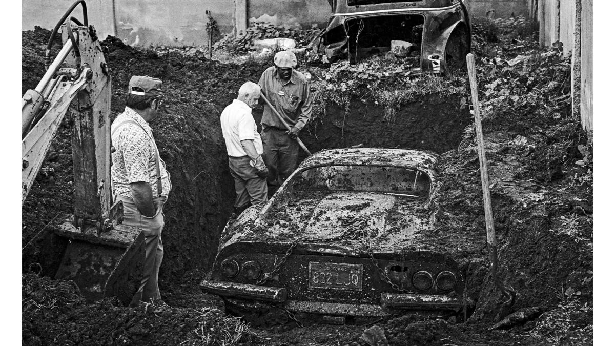 Feb. 7, 1978: A buried Ferrari stolen in 1974, is dug up from a backyard on W. 119th Street, still in good condition.