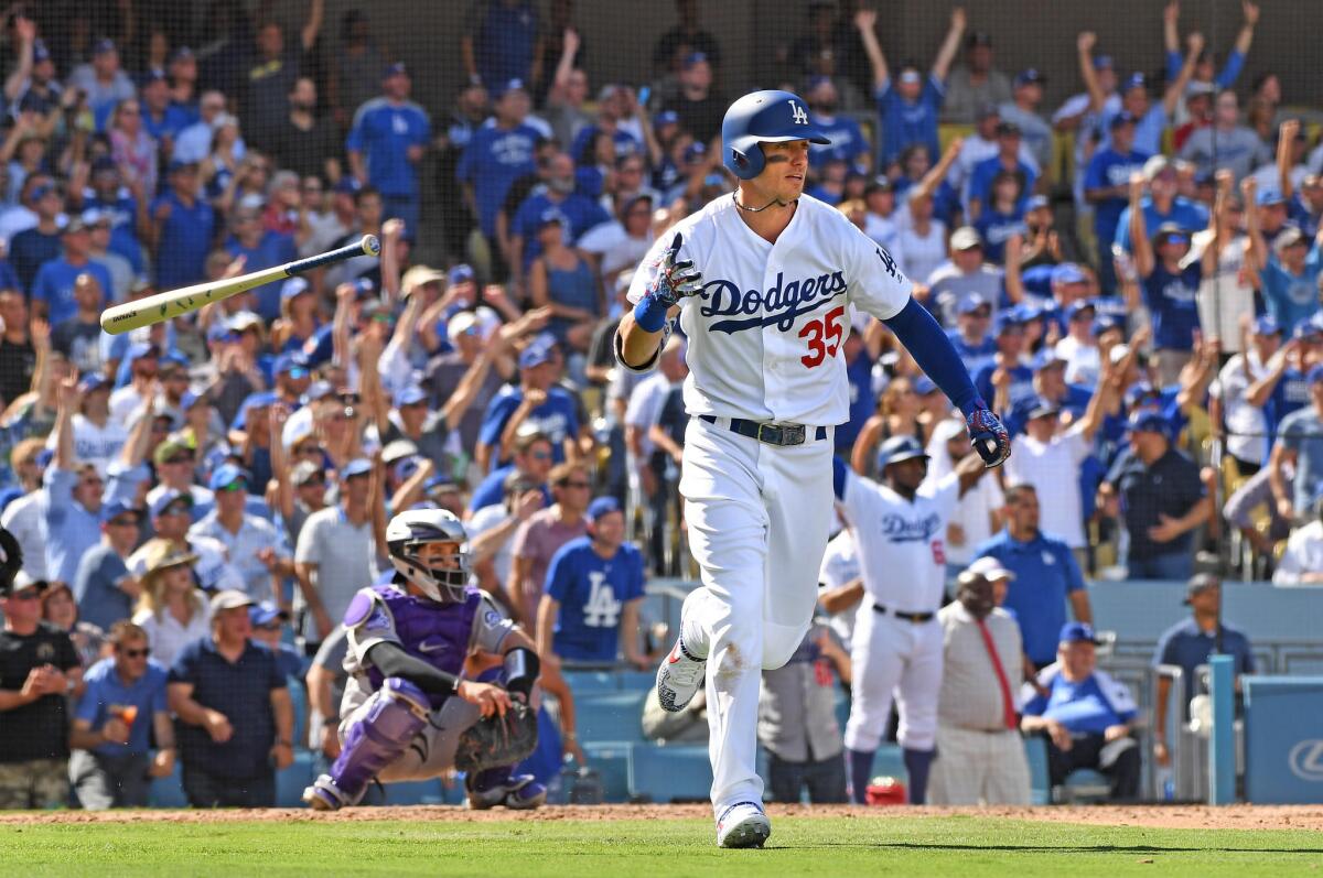 Cody Bellinger hits a two-run home run against the Rockies in the fourth inning at Dodger Stadium on Monday.