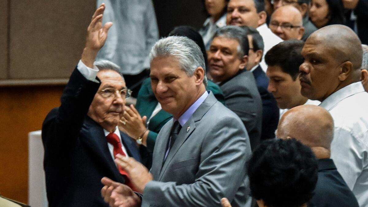 Cuban President Raul Castro, left, with First Vice President Miguel Diaz-Canel, center, during a National Assembly session in Havana on April 18, 2018, that will select the Council of State ahead of the naming of a new president.