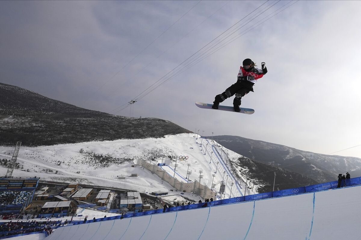 FILE - United States' Chloe Kim competes during the women's halfpipe finals at the 2022 Winter Olympics, Feb. 10, 2022, in Zhangjiakou, China. (AP Photo/Gregory Bull, File)