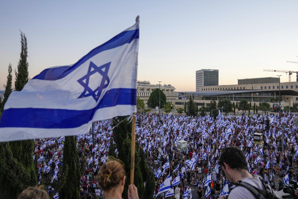 Thousands of Israelis protest against plans by Prime Minister Benjamin Netanyahu's government to overhaul the judicial system