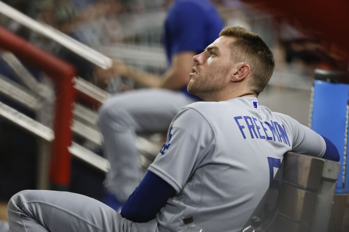 Freddie Freeman looks toward the scoreboard during a game between the Dodgers and the Atlanta Braves on Sunday.
