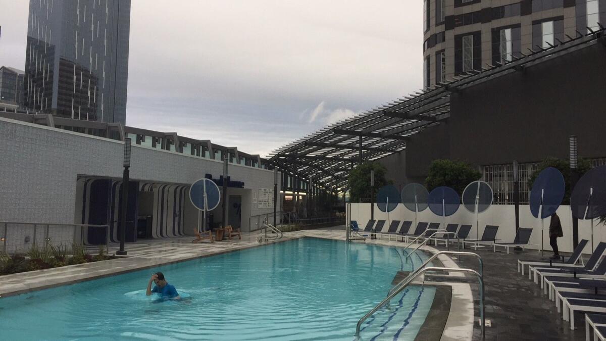 A visitor enjoys the pool for one at the InterContinental hotel.