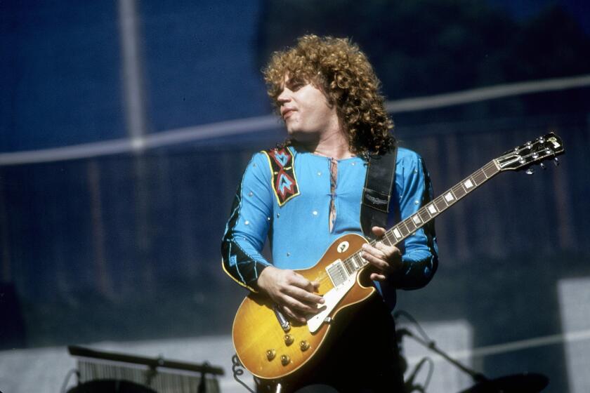 Gary Richrath playing with REO Speedwagon in 1980. The guitarist died Sunday.