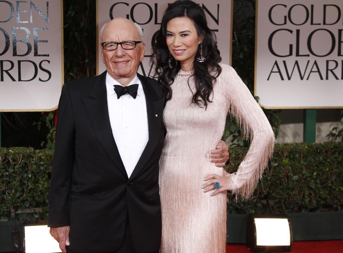 Rupert Murdoch is waiting for the state to grant him a liquor license so he can complete his purchase of Moraga Vineyards. Above, Murdoch and wife Wendi Deng Murdoch at the 2012 Golden Globe Awards show.