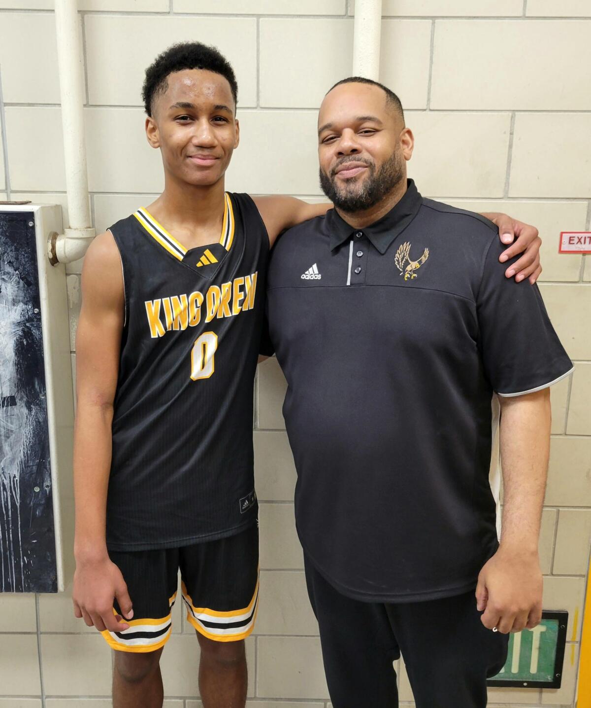 King/Drew coach Lloyd Webster with his son, Josahn.