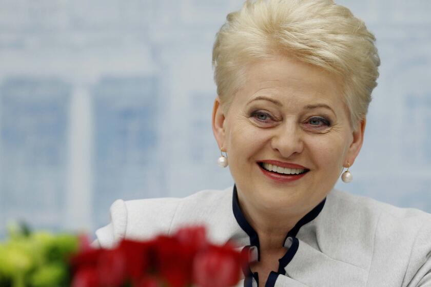 Lithuanian President Dalia Grybauskaite, who won reelection in a landslide last month, prevailed Wednesday in her quest to see the Baltic country admitted into the Eurozone next year.