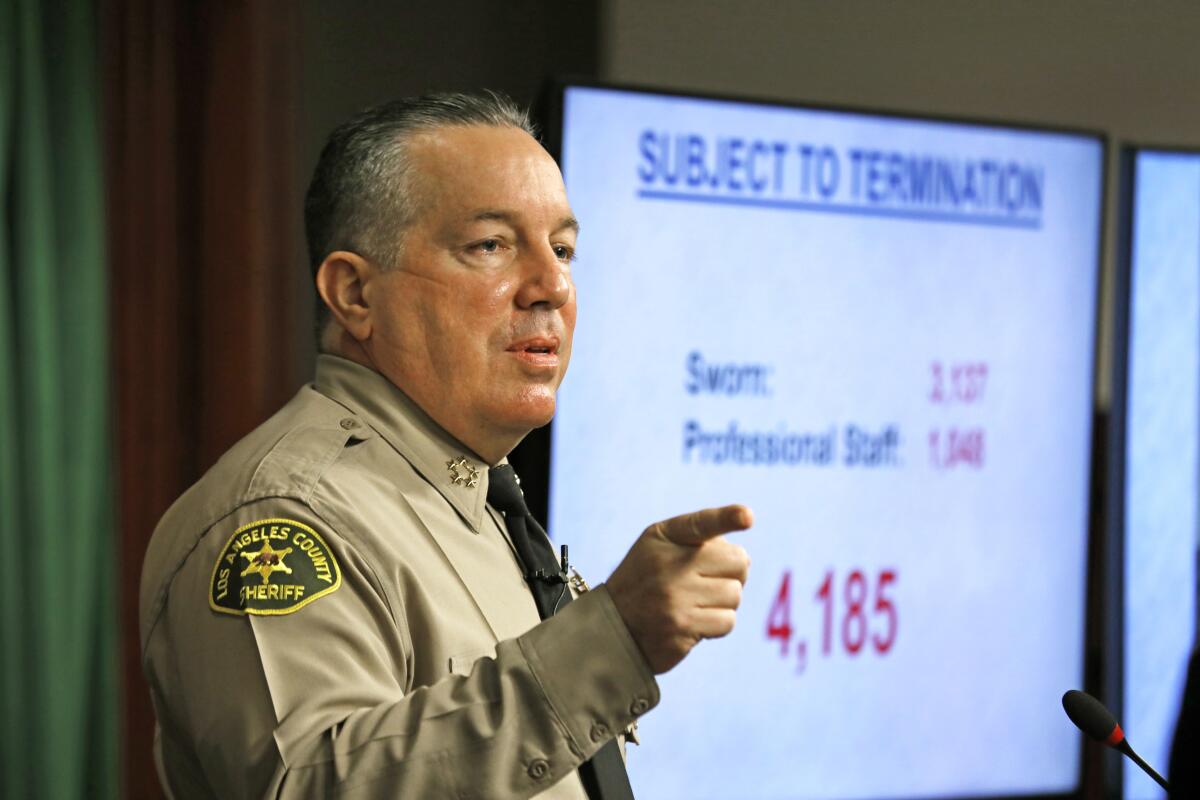 L.A. County Sheriff Alex Villanueva speaks at a news conference