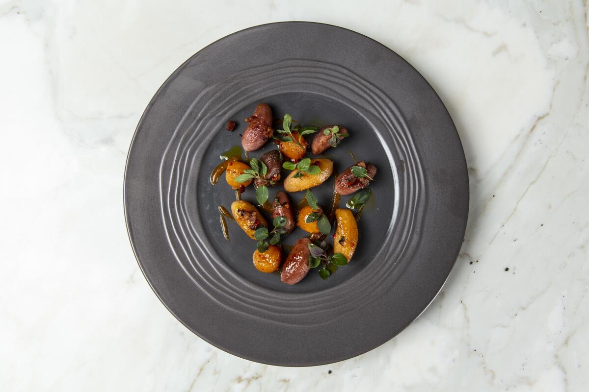 A dish of potatoes, pancetta, persimmon and mint from the new Citrin in Santa Monica.