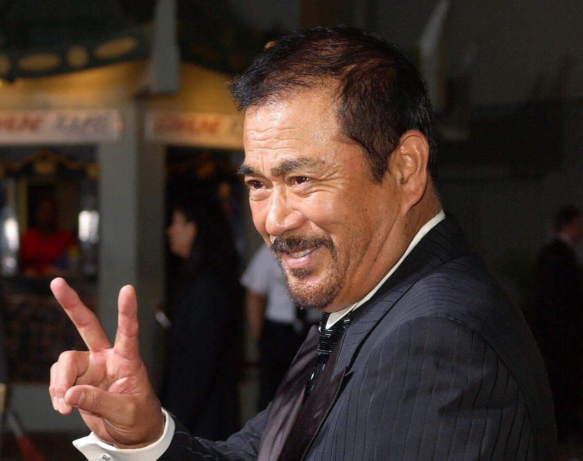  Japanese actor Sonny Chiba arrives for the premiere of the film 'Kill Bill: Volume 1'