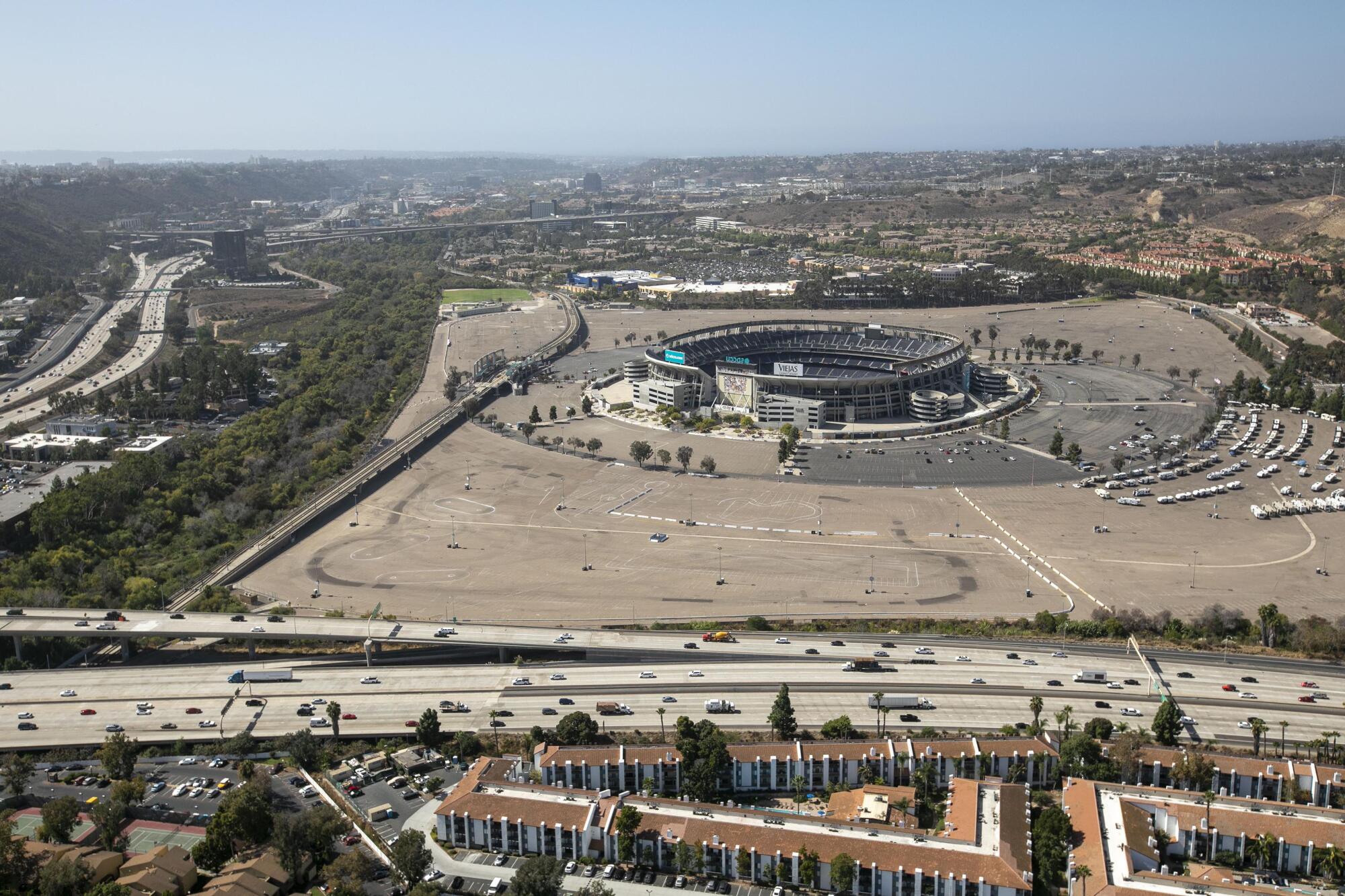 View of the stadium in Mission Valley looking down towards the west. The San Diego River is at the left, and the Murphy Canyon creek is at the edge of the parking lot by the Interstate. Photo made during a photo flight on Friday, October 18, 2019