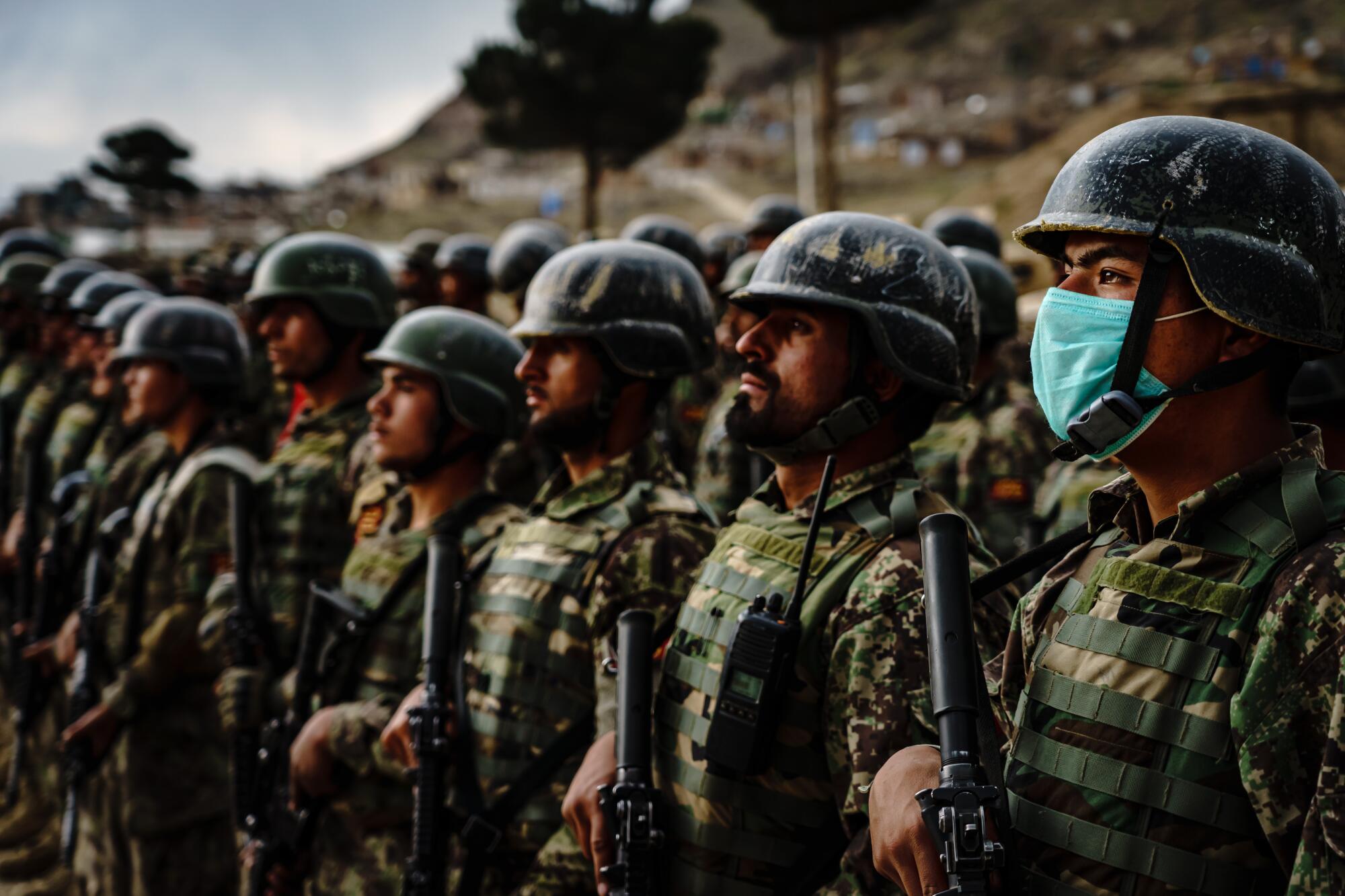  Afghan Army special forces commandos stand in formation.