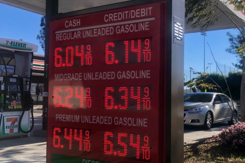 Posted prices at a 7-11 gas station in Linda Vista  