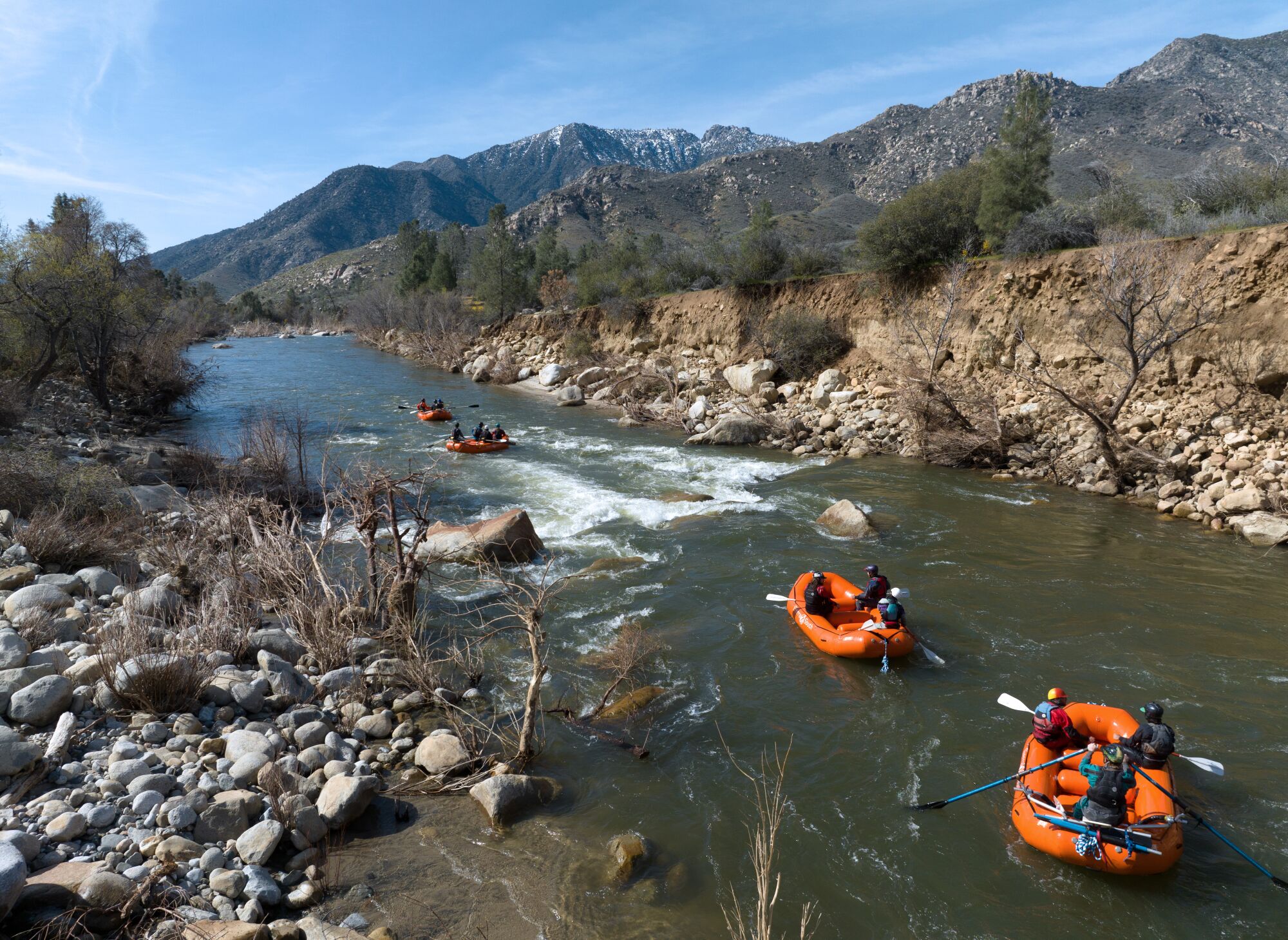 Rafts float down a quiet section of the Upper Kern River in Kernville.