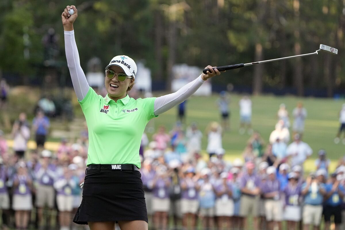 Minjee Lee, of Australia, celebrates a win after the final round of the U.S. Women's Open golf tournament at the Pine Needles Lodge & Golf Club in Southern Pines, N.C., on Sunday, June 5, 2022. Minjee Lee, of Australia, won the match. (AP Photo/Chris Carlson)