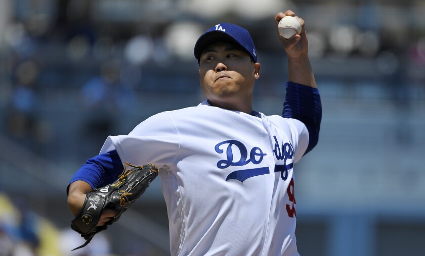Dodgers starter Hyun-Jin Ryu delivers during first inning of 9-3 victory over the Arizona Diamondbacks on Sunday.