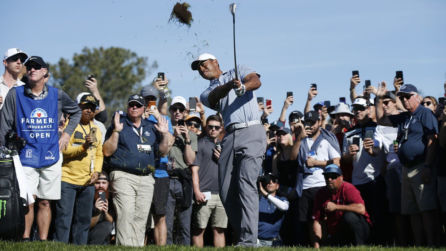 Tiger Woods hits out of the rough on the 2nd hole during the third round of the Farmers Insurance Open at the Torrey Pines Golf Course on Jan. 26, 2019. (Photo by K.C. Alfred/San Diego Union-Tribune)